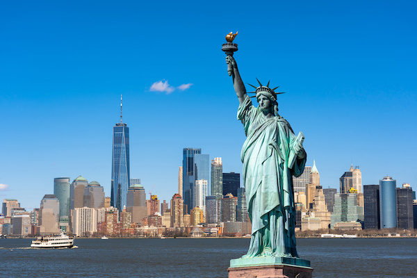 The Statue of Liberty over the Scene of New york cityscape river side which location is lower manhattanArchitecture and building with tourist concept - New York Day Trip - New York Day Trip New York Private Tours | New York Day Trip - Licensed Guides - New York Day Trip